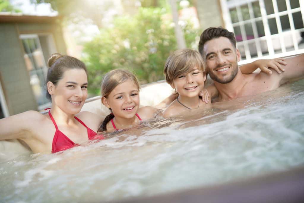 people in inflatable lazy spa