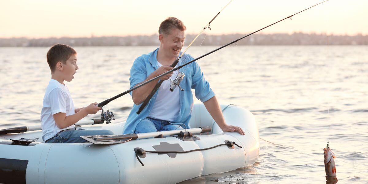 Father and Son in an Inflatable Boat Fishing