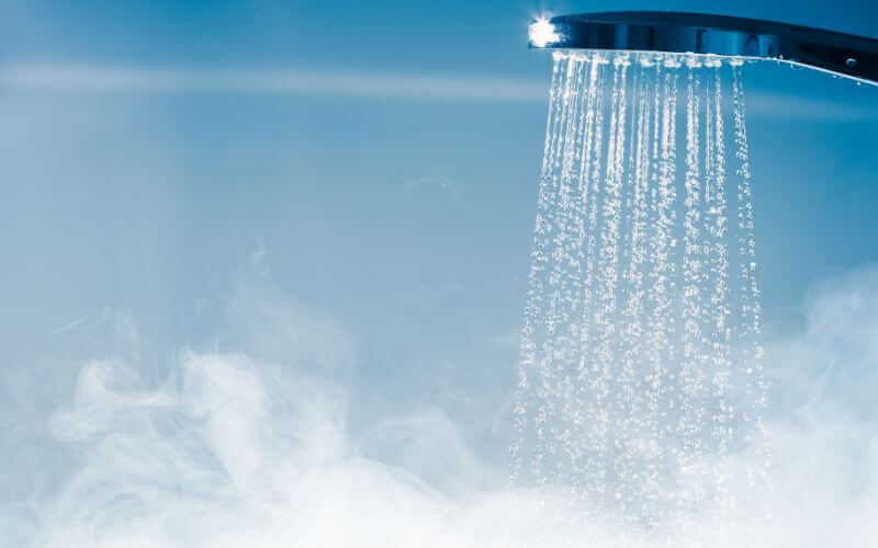 Shower with flowing water and steam