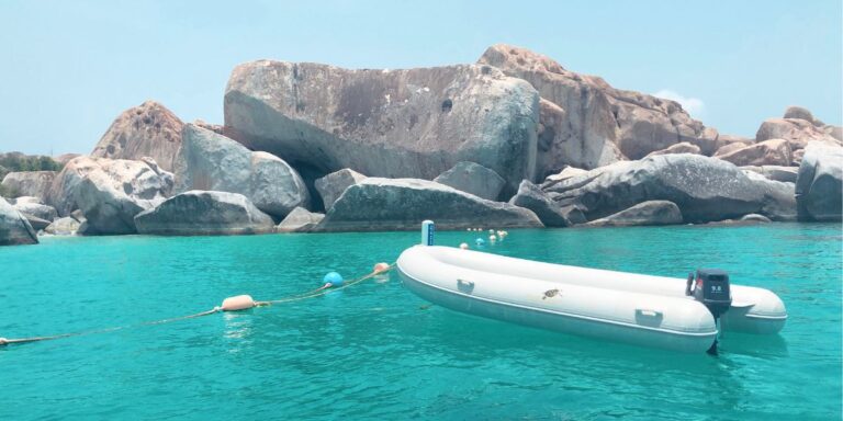 White inflatable boat on the ocean
