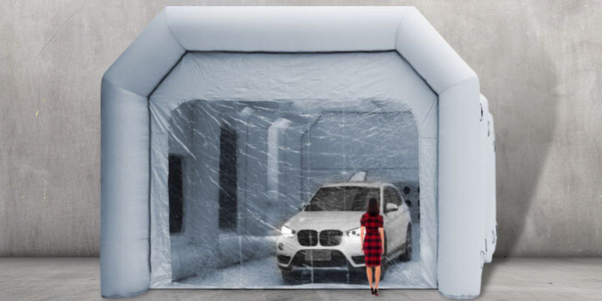 a car inside an inflatable paint booth