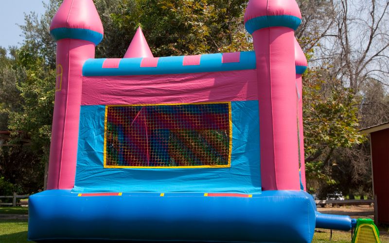 pink and blue bouncy castle