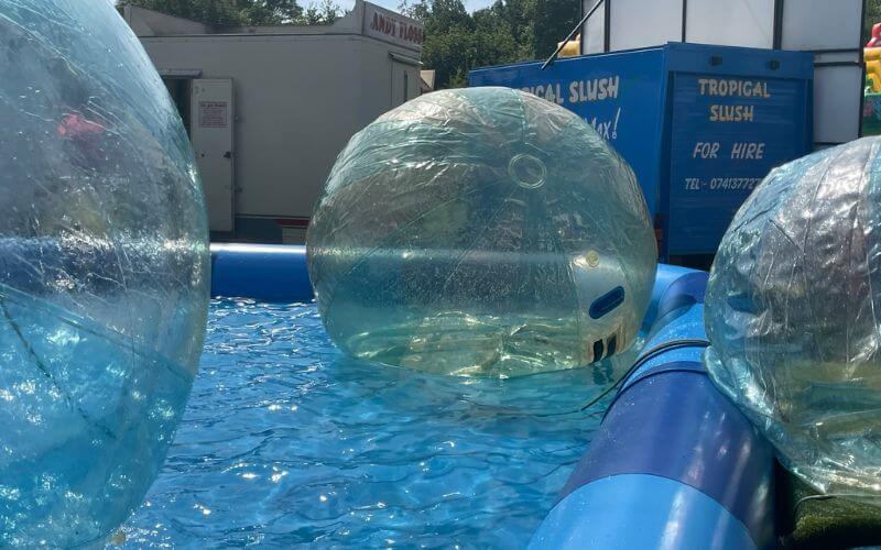 popped zorb ball on water